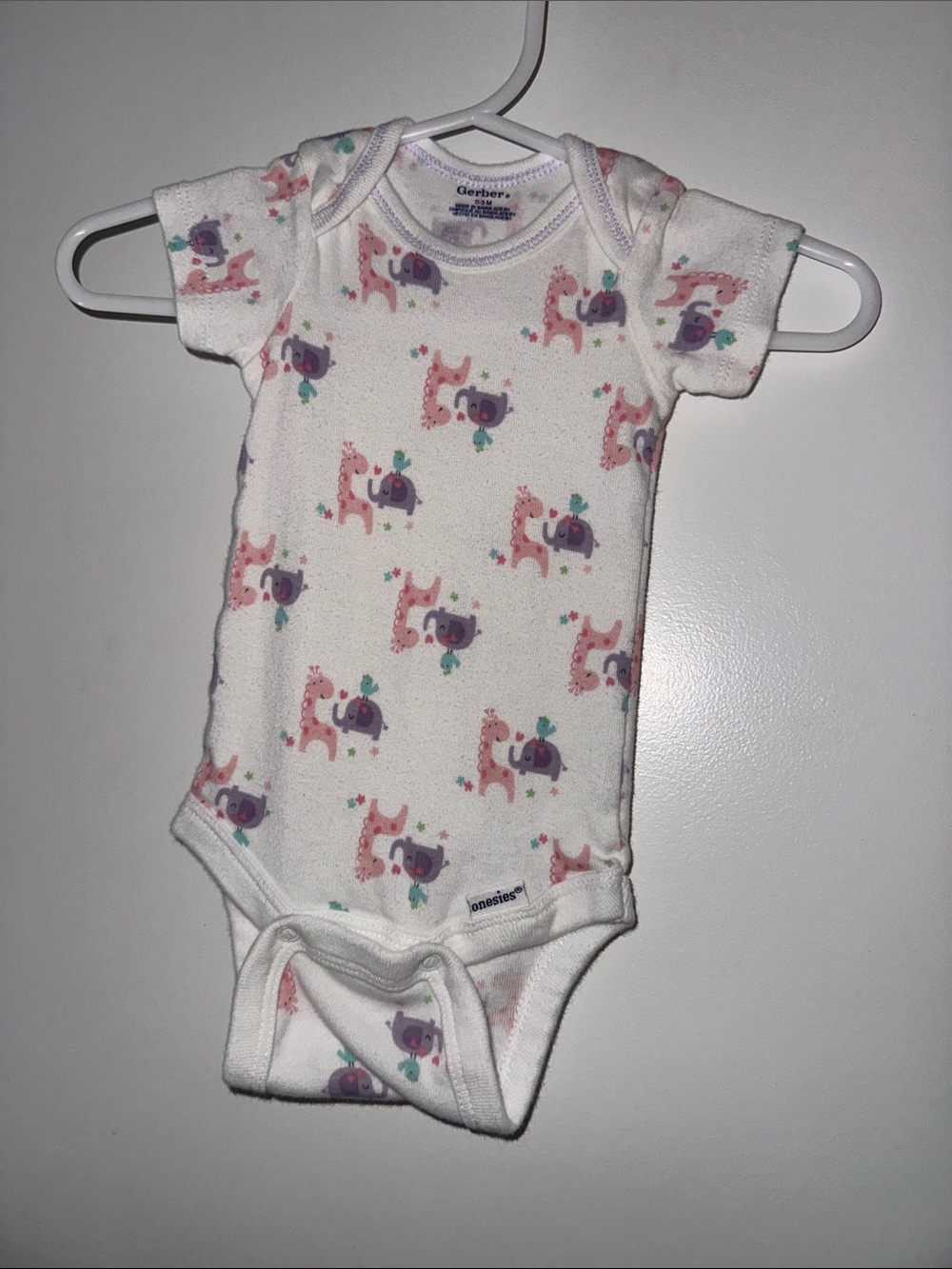 Gerber White Onesie with Pink Giraffe and Purple Elephant Pattern